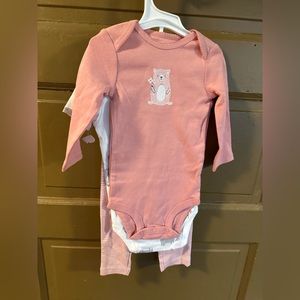 Baby girl 2 onesie and a pair of matching pants.